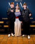 The Returning Blazer at the MAMo 2026 step and repeat